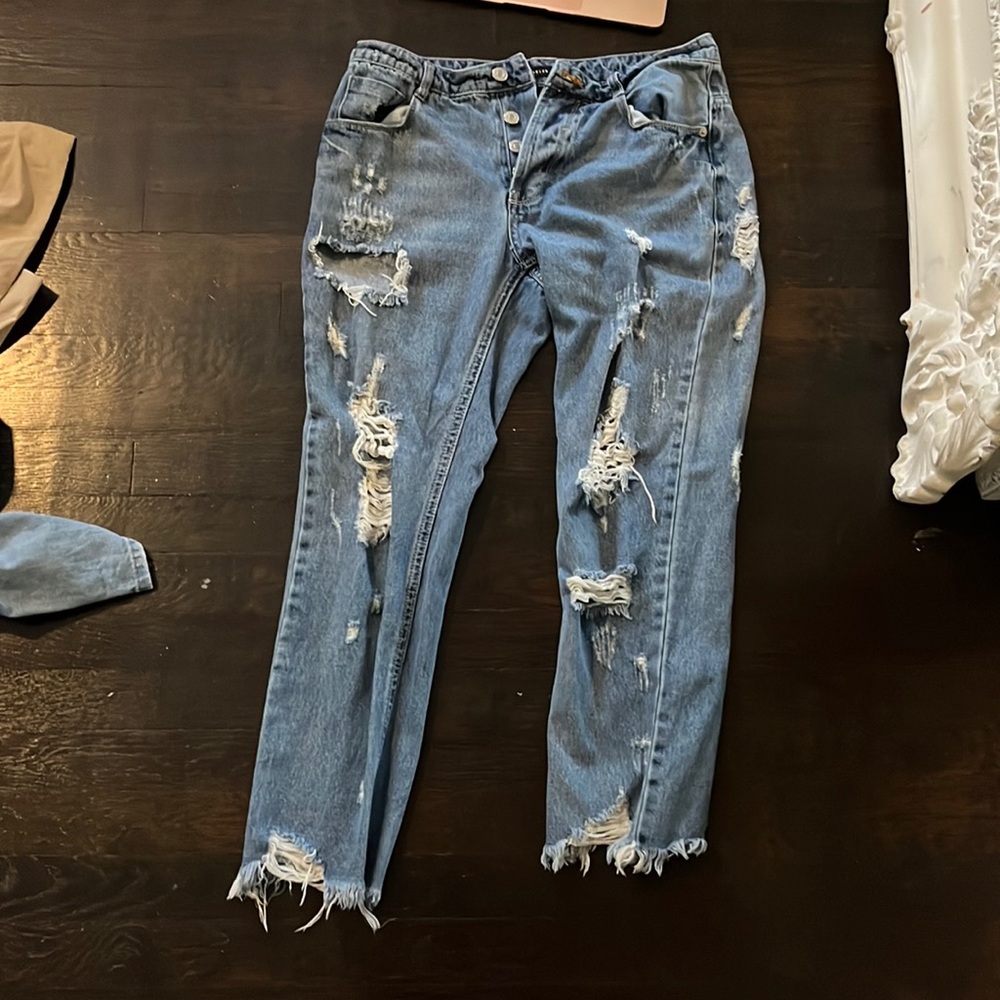 Brooklyn karma ripped blue jeans